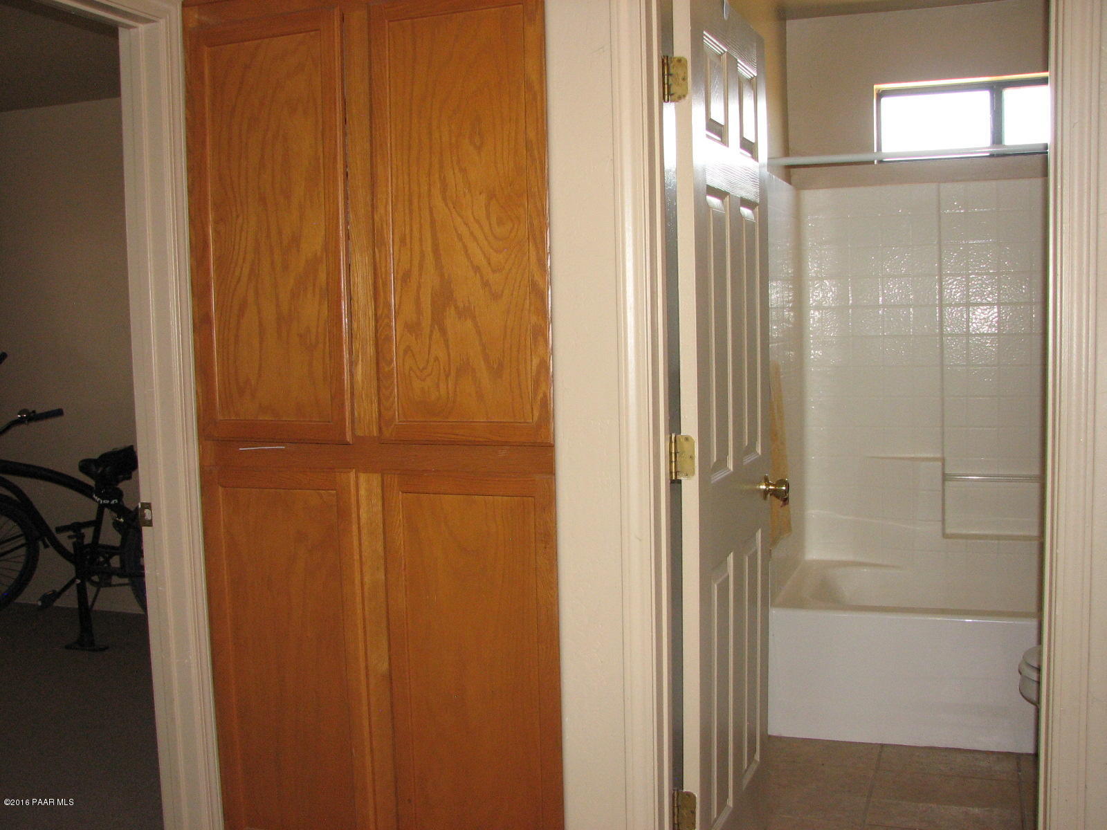 543 West Ahonen Road Paulden, AZ 86334 - Photo 9 of 24 a bathroom with a glass shower door