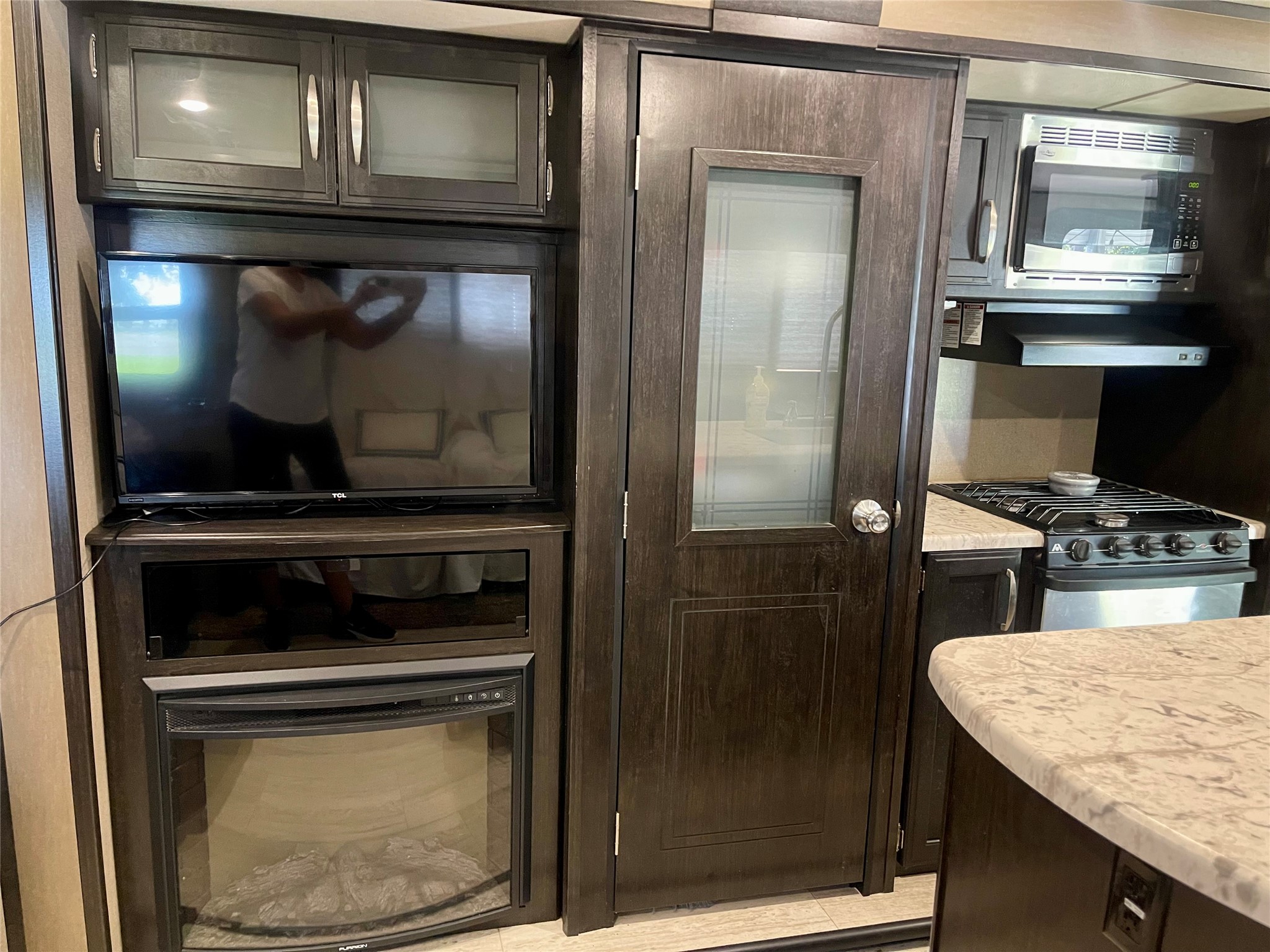 520 Lake Shore Drive Trinity, TX 75862 - Photo 7 of 19 a kitchen with a stove and a microwave