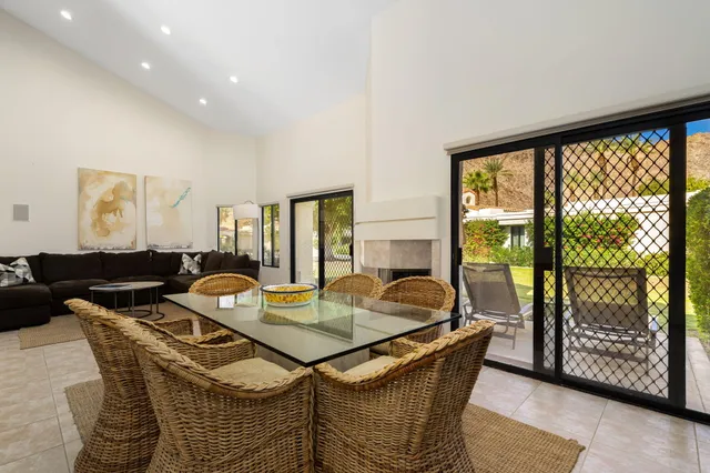 a kitchen with stainless steel appliances a stove microwave and refrigerator