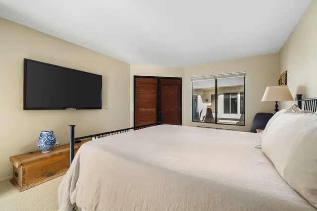 a bathroom with a sink double vanity and a mirror