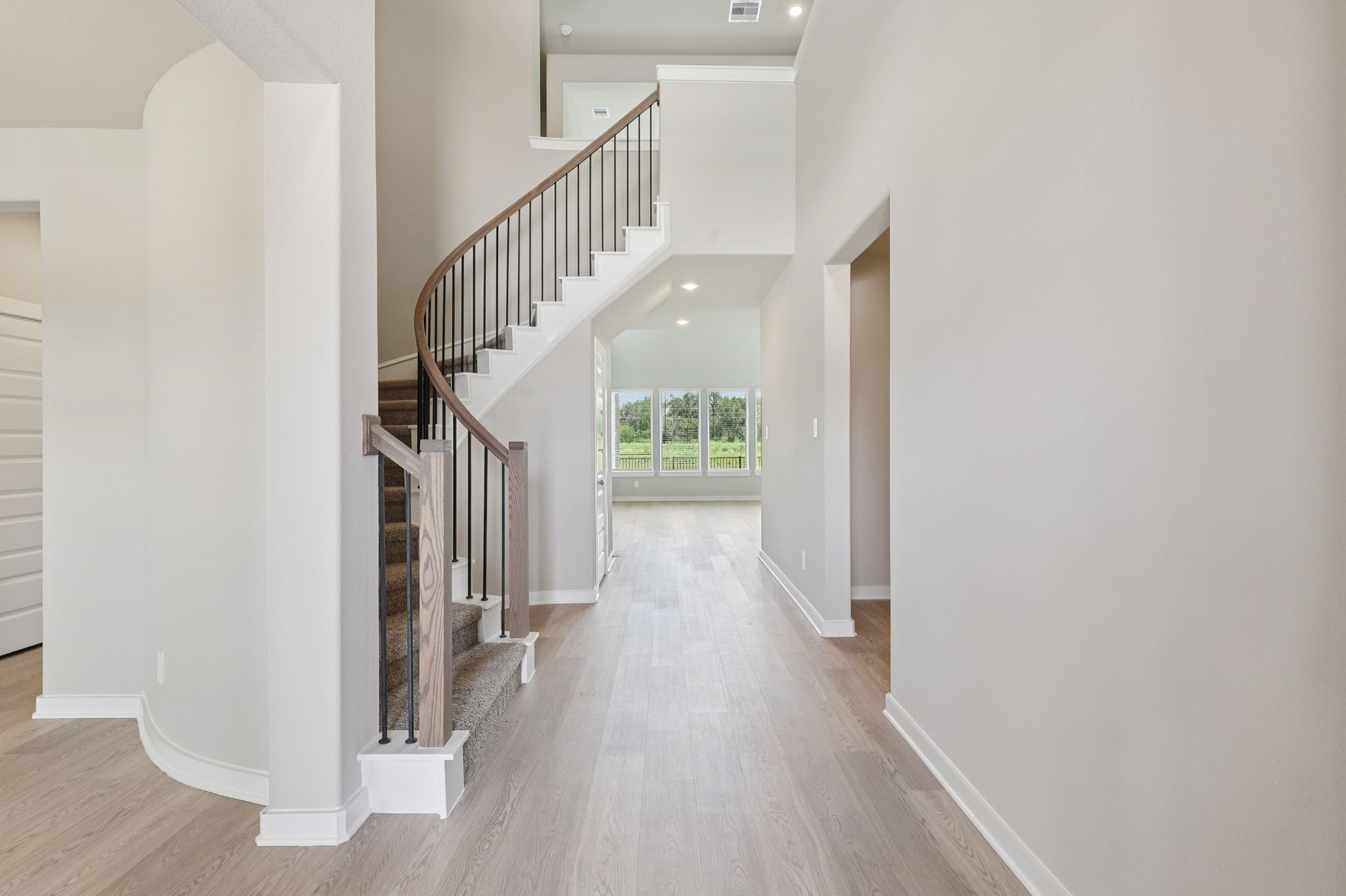 5710 Chamberlain Crossing Rosenberg, TX 77471 - Photo 4 of 40 a view of hallway with wooden floor