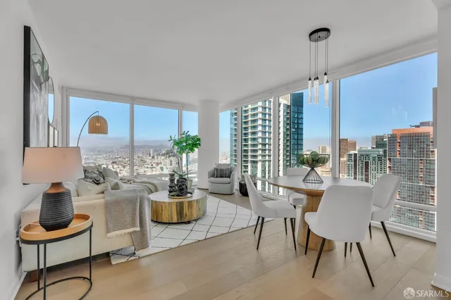 a view of a dining room with furniture window and outside view