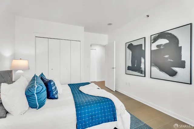 a bathroom with a toilet sink and shower