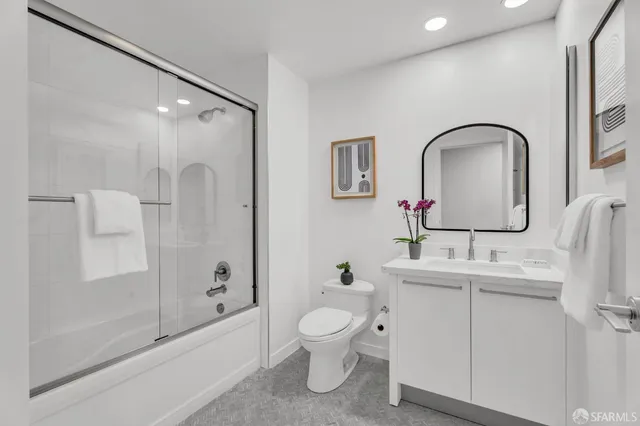 a view of a hallway with washer and dryer