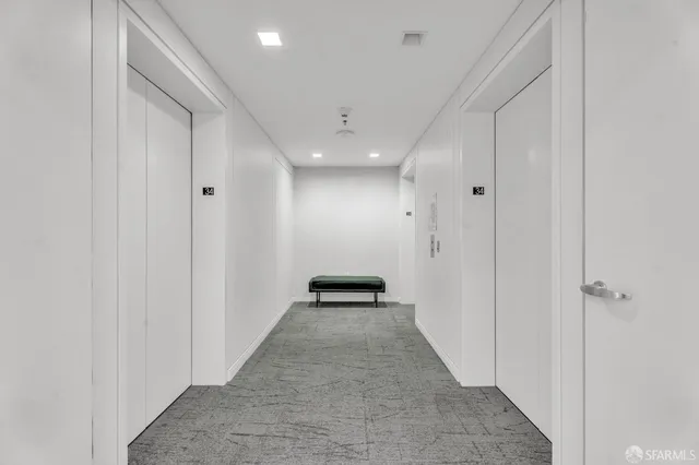 a view of swimming pool with outdoor seating and plants