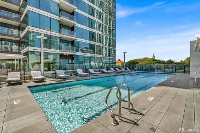 a room with gym equipment and a large window