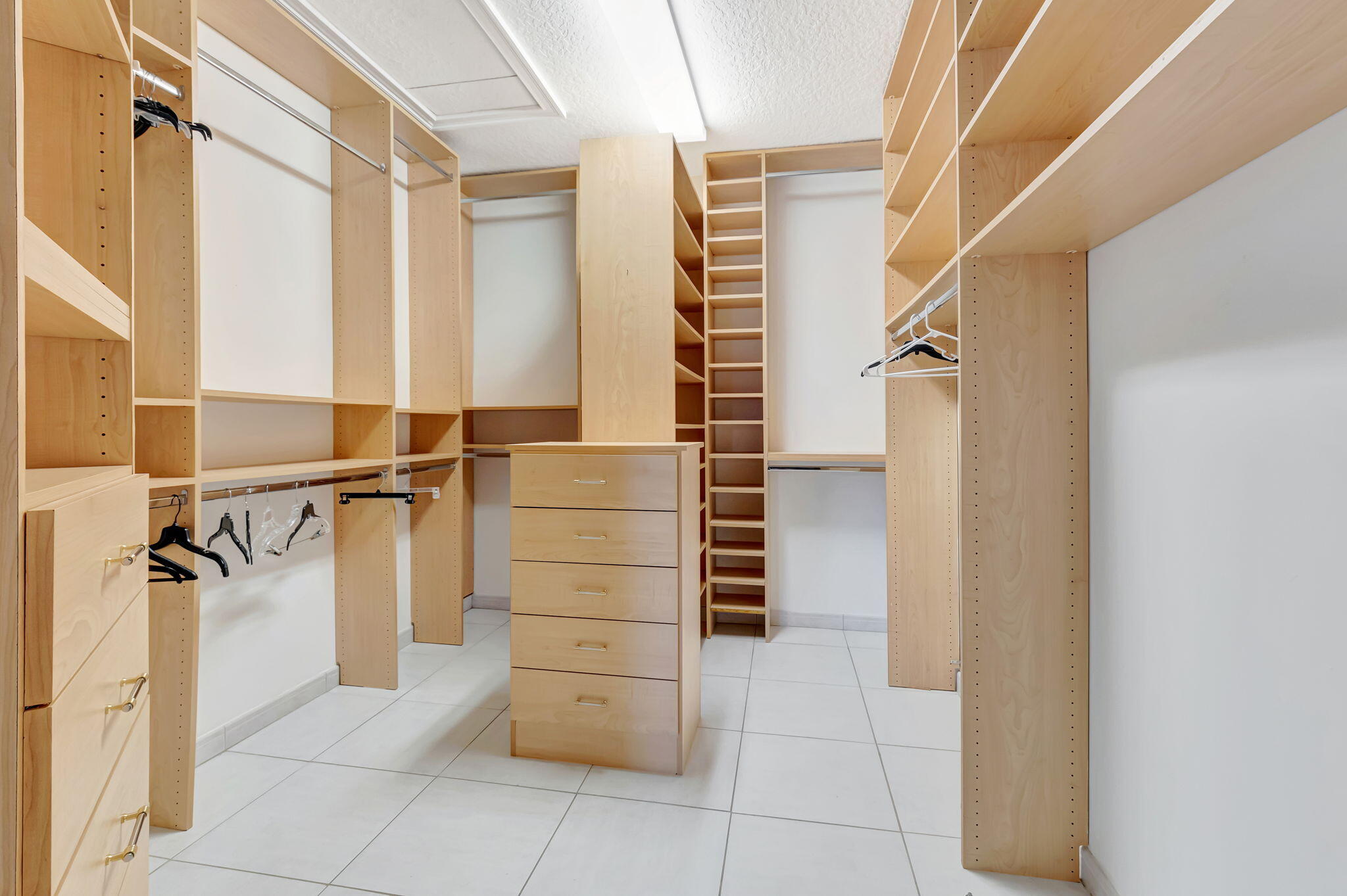 9152 Long Lake Palm Drive Boca Raton, FL 33496 - Photo 19 of 36 a view of walk in closet and stairs