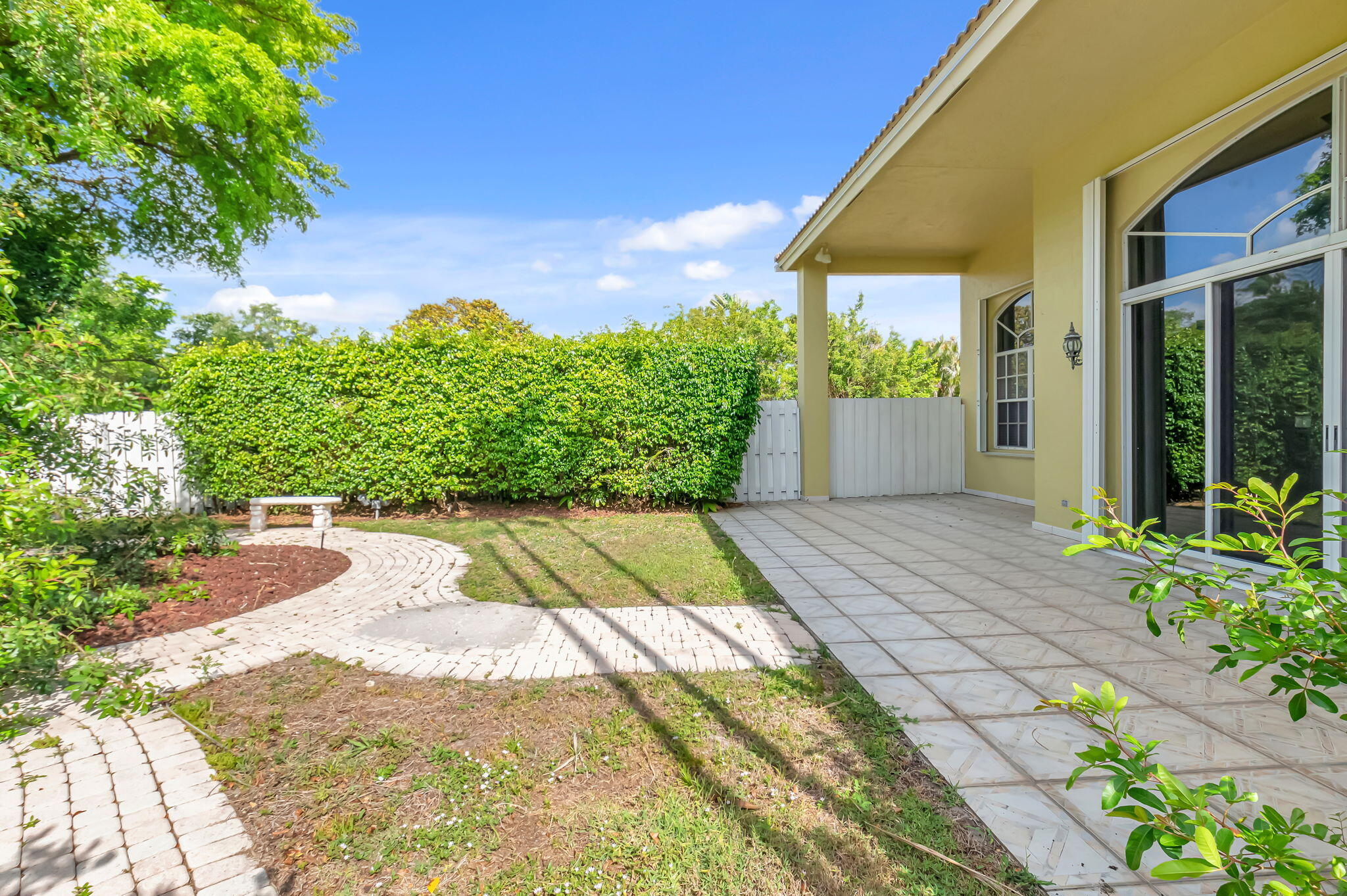 9152 Long Lake Palm Drive Boca Raton, FL 33496 - Photo 30 of 36 a view of back yard of the house