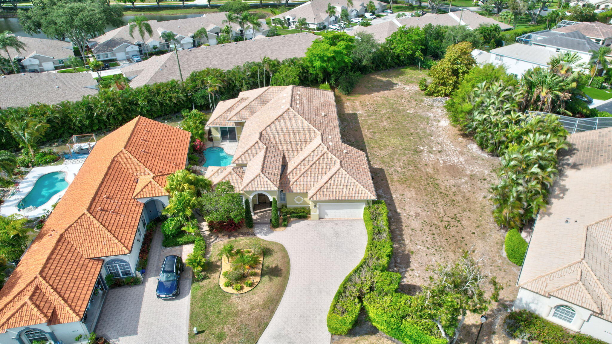 9152 Long Lake Palm Drive Boca Raton, FL 33496 - Photo 33 of 36 an aerial view of a house with outdoor space