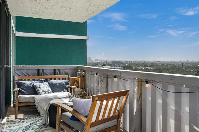 a bed room with a bed and a television