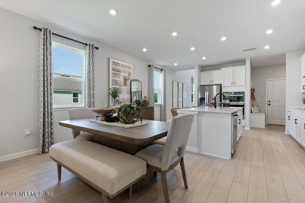 1353 Ribbon Place Palm Coast, FL 32164 - Photo 5 of 28 Amelia II - dining2