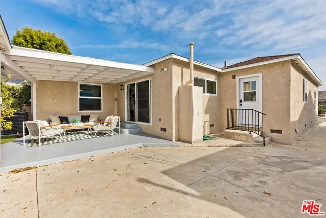 a view of a house with a patio