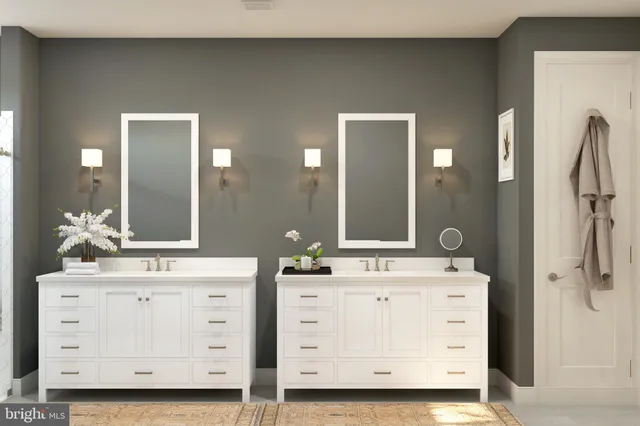 a bathroom with a double vanity sink and mirror