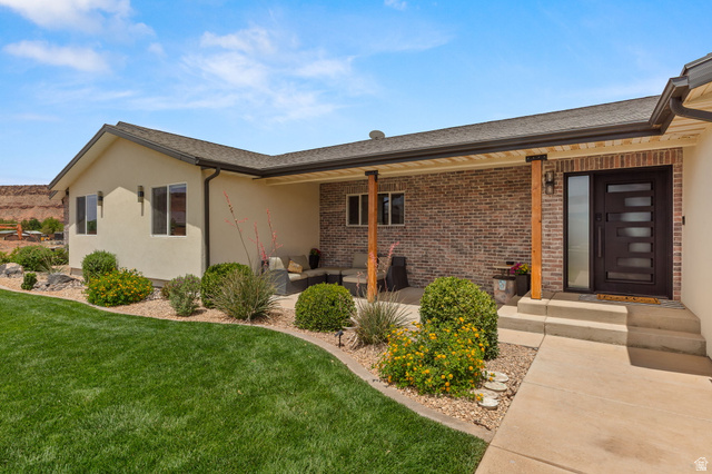 2591 East Washington Dam Road Washington, UT 84780 - Photo 1 of 67 Contemporary exterior with stucco and brick accents