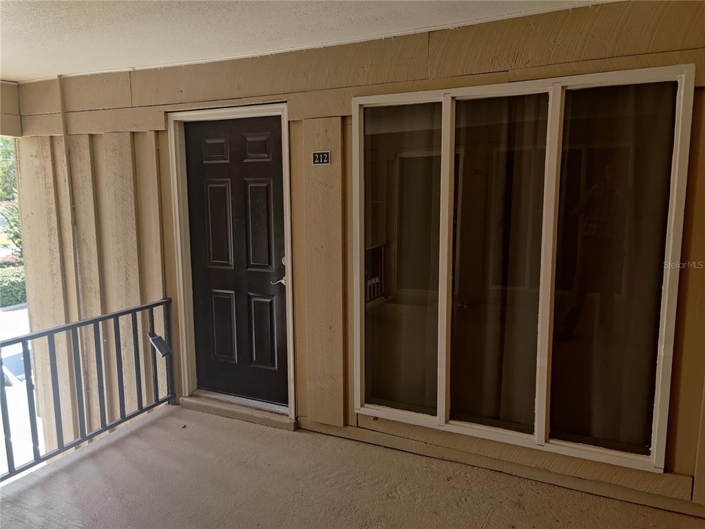507 Northwest 39th Road, Unit 212 Gainesville, FL 32607 - Photo 1 of 1 a view of porch with yard