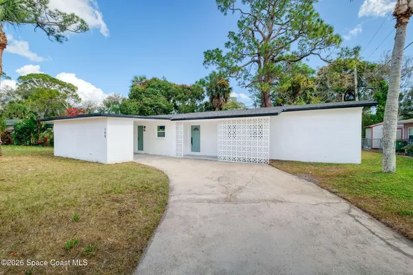 front view of house with a yard