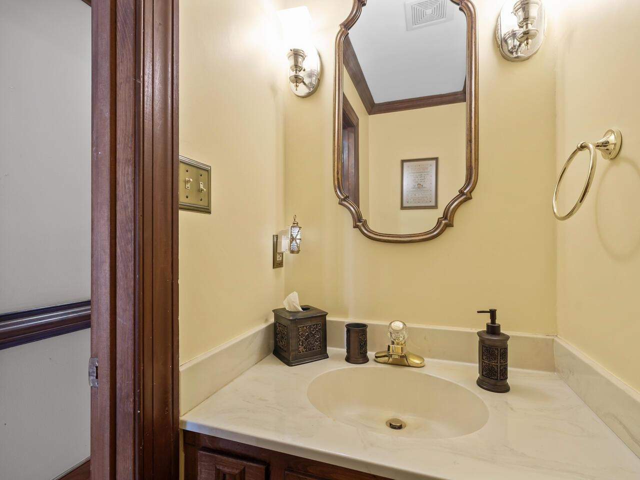 2603 Sawmill Road Raleigh, NC 27613 - Photo 21 of 53 a bathroom with a sink and a mirror