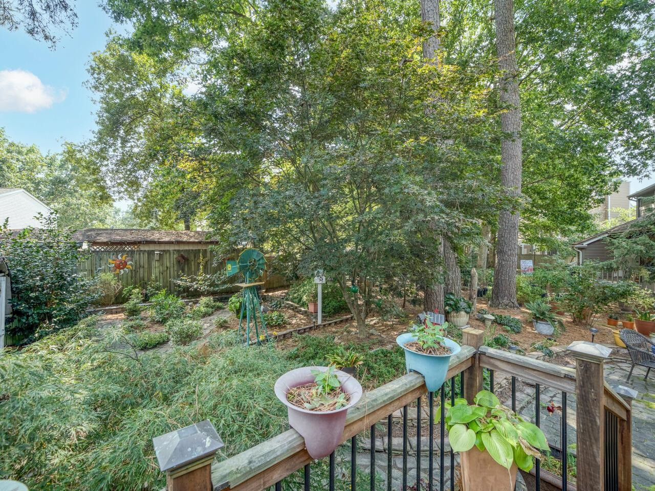 2603 Sawmill Road Raleigh, NC 27613 - Photo 42 of 53 a view of a chair and table in backyard