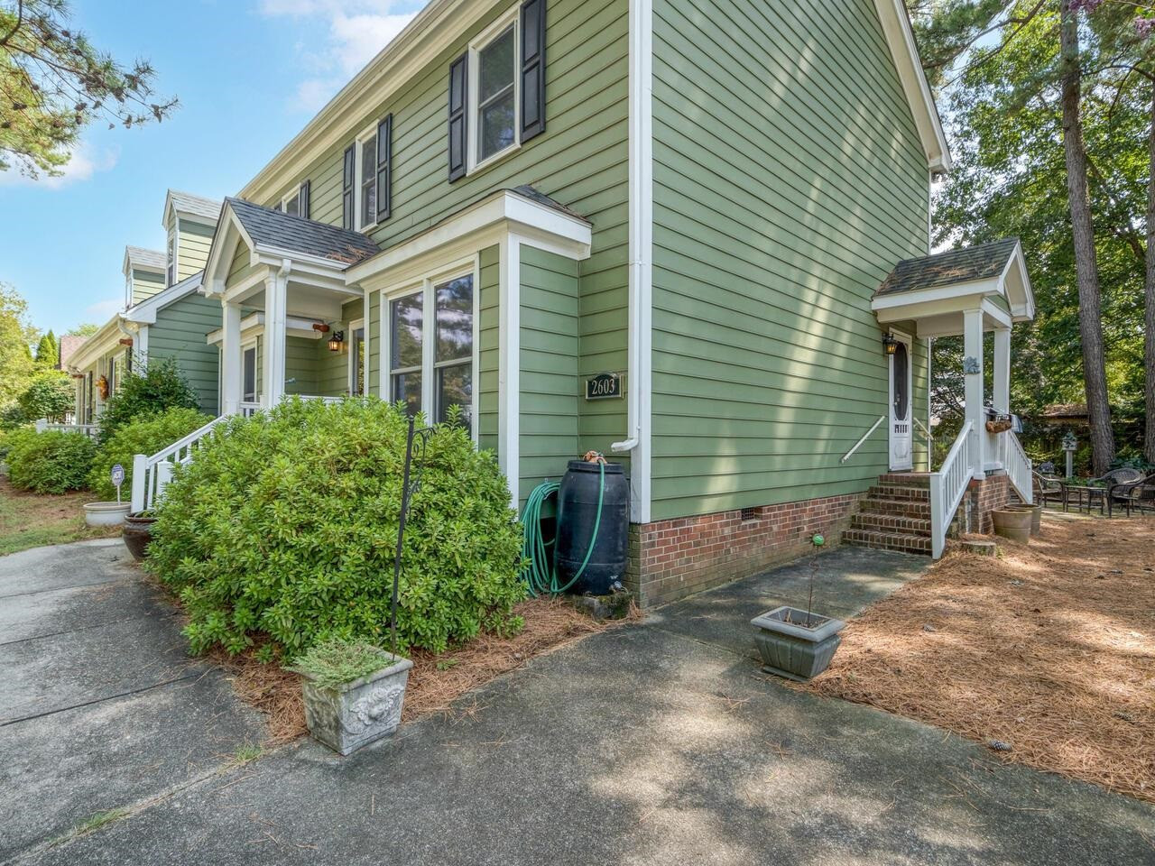 2603 Sawmill Road Raleigh, NC 27613 - Photo 5 of 53 a view of a house with a yard