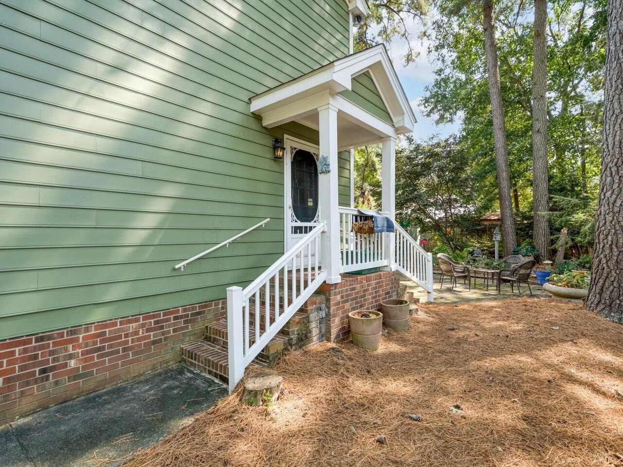 2603 Sawmill Road Raleigh, NC 27613 - Photo 6 of 53 a view of a house with backyard and trees