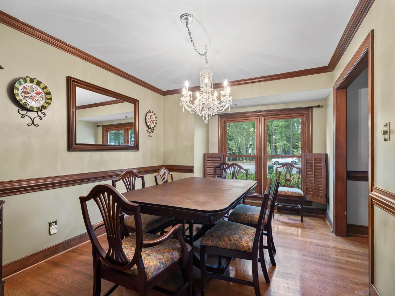 2603 Sawmill Road Raleigh, NC 27613 - Photo 9 of 53 a view of a dining room with furniture window and wooden floor