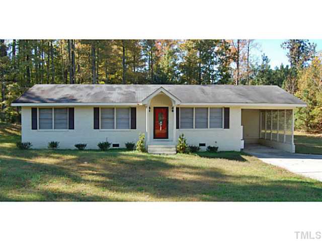 3204 Sanderford Road Raleigh, NC 27610 - Photo 1 of 15 a front view of a house with a yard