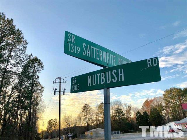 4.92-acres Satterwhite Point Road Henderson, NC 27537 - Photo 2 of 7 a street sign on a pole on a street