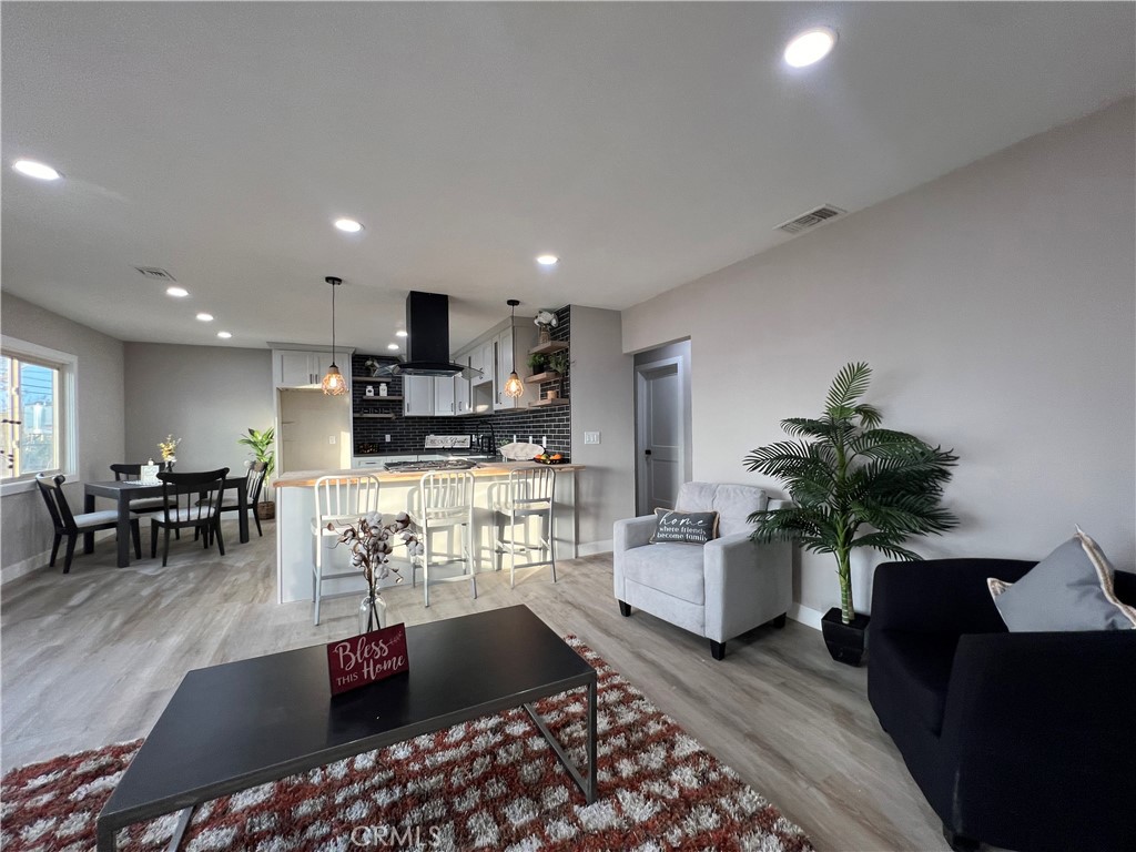 4141 California Norco, CA 92860 - Photo 21 of 28 a living room with furniture a couch and a potted plant