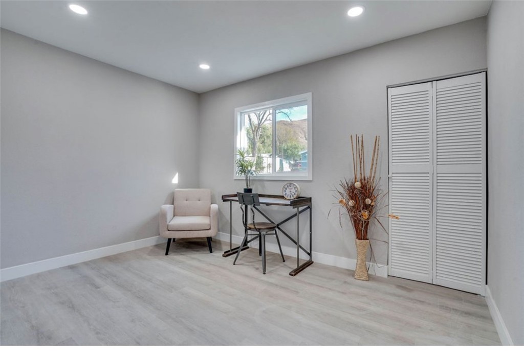 4141 California Norco, CA 92860 - Photo 24 of 28 a living room with furniture and a wooden floor