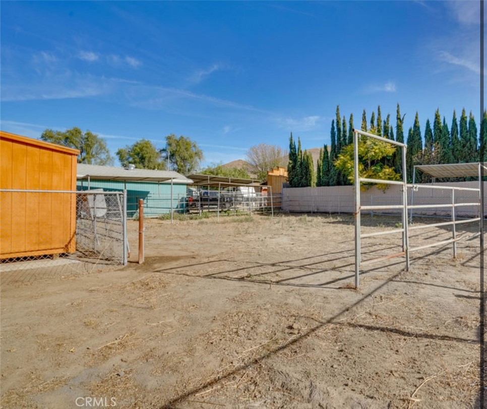 4141 California Norco, CA 92860 - Photo 26 of 28 a view of a house with backyard and a patio