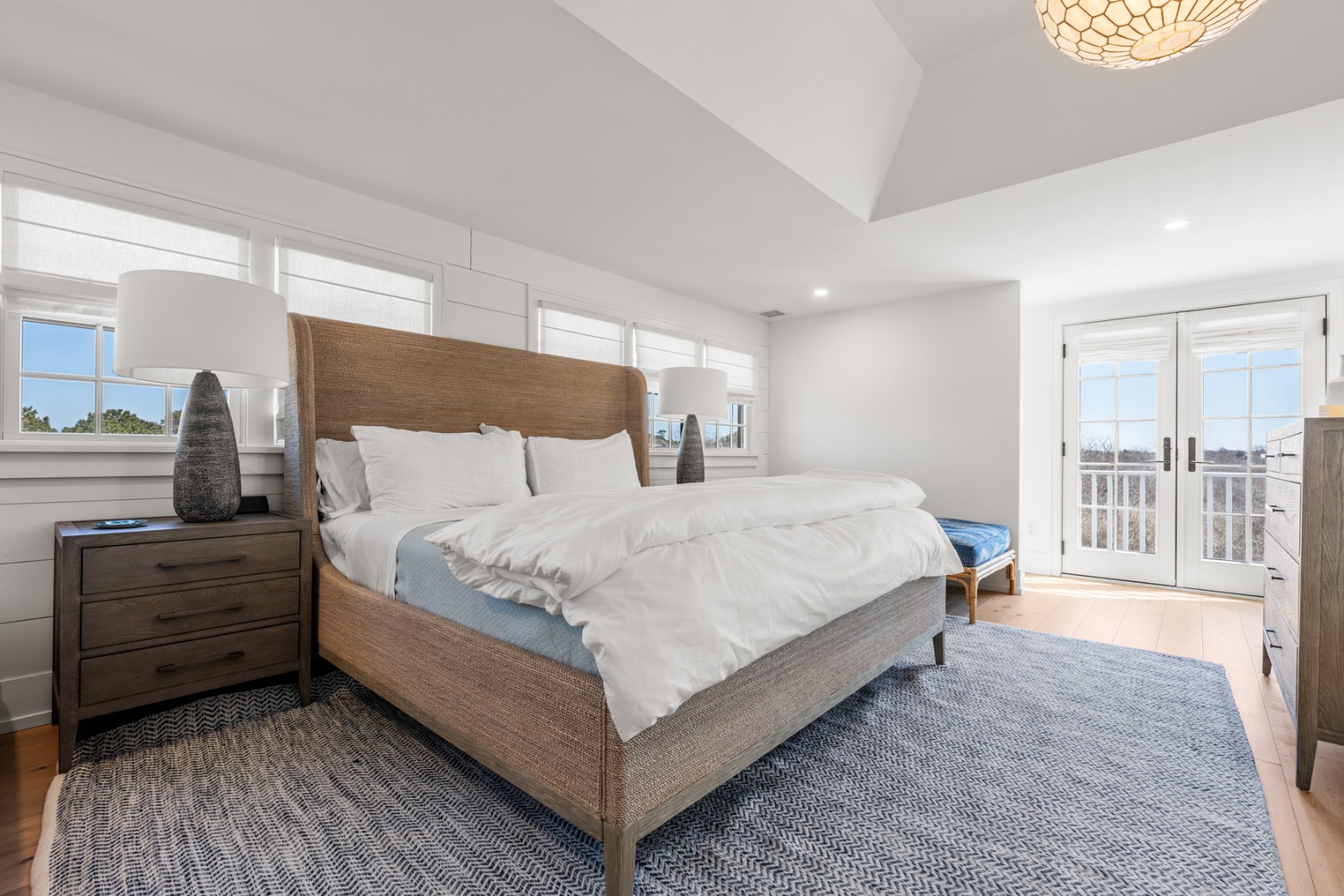 174 Cliff Road Nantucket, MA 02554 - Photo 42 of 49 a bed room with a bed and a large window