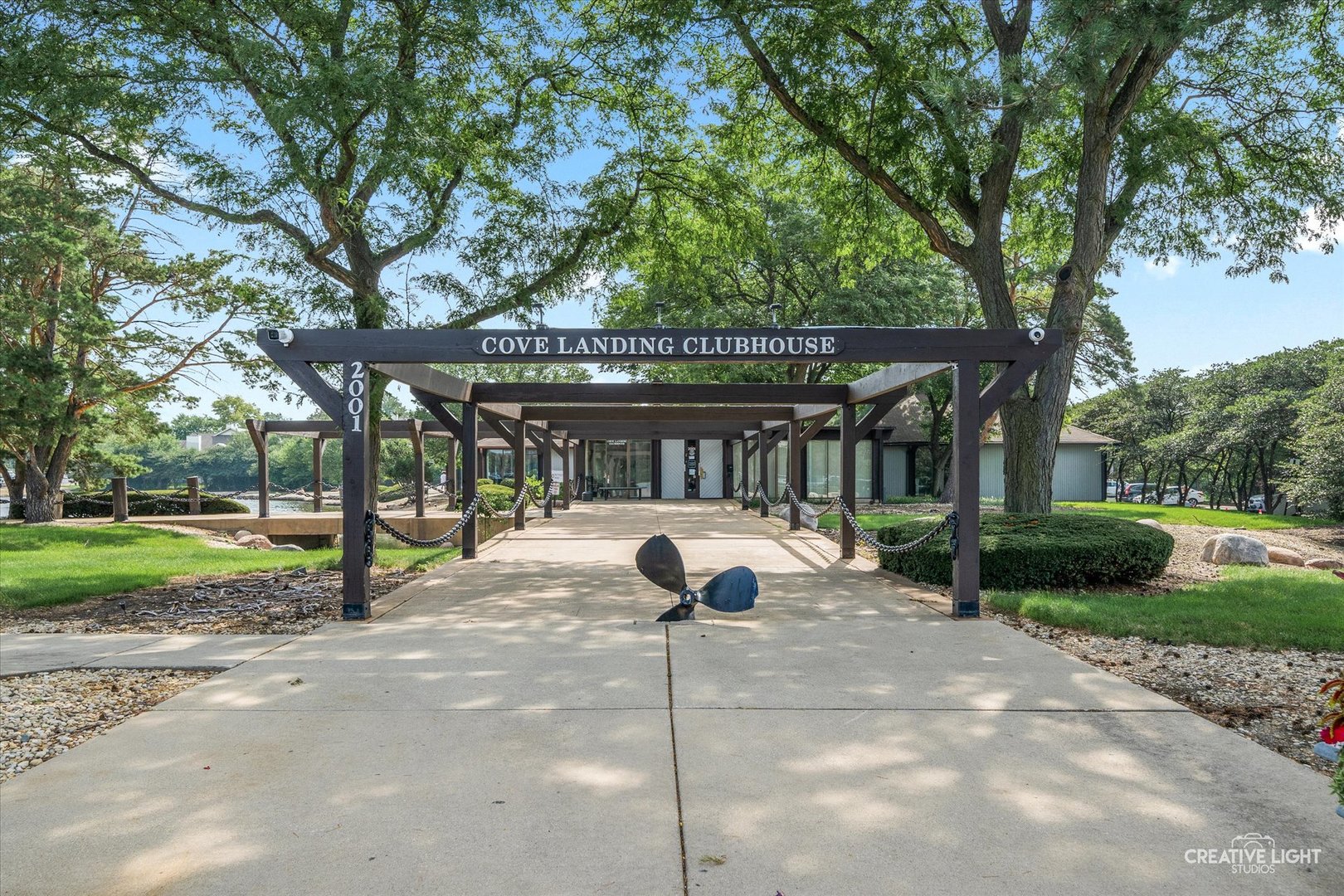 2005 South Finley Road, Unit 1209 Lombard, IL 60148 - Photo 18 of 29 a view of street with sitting area and garden