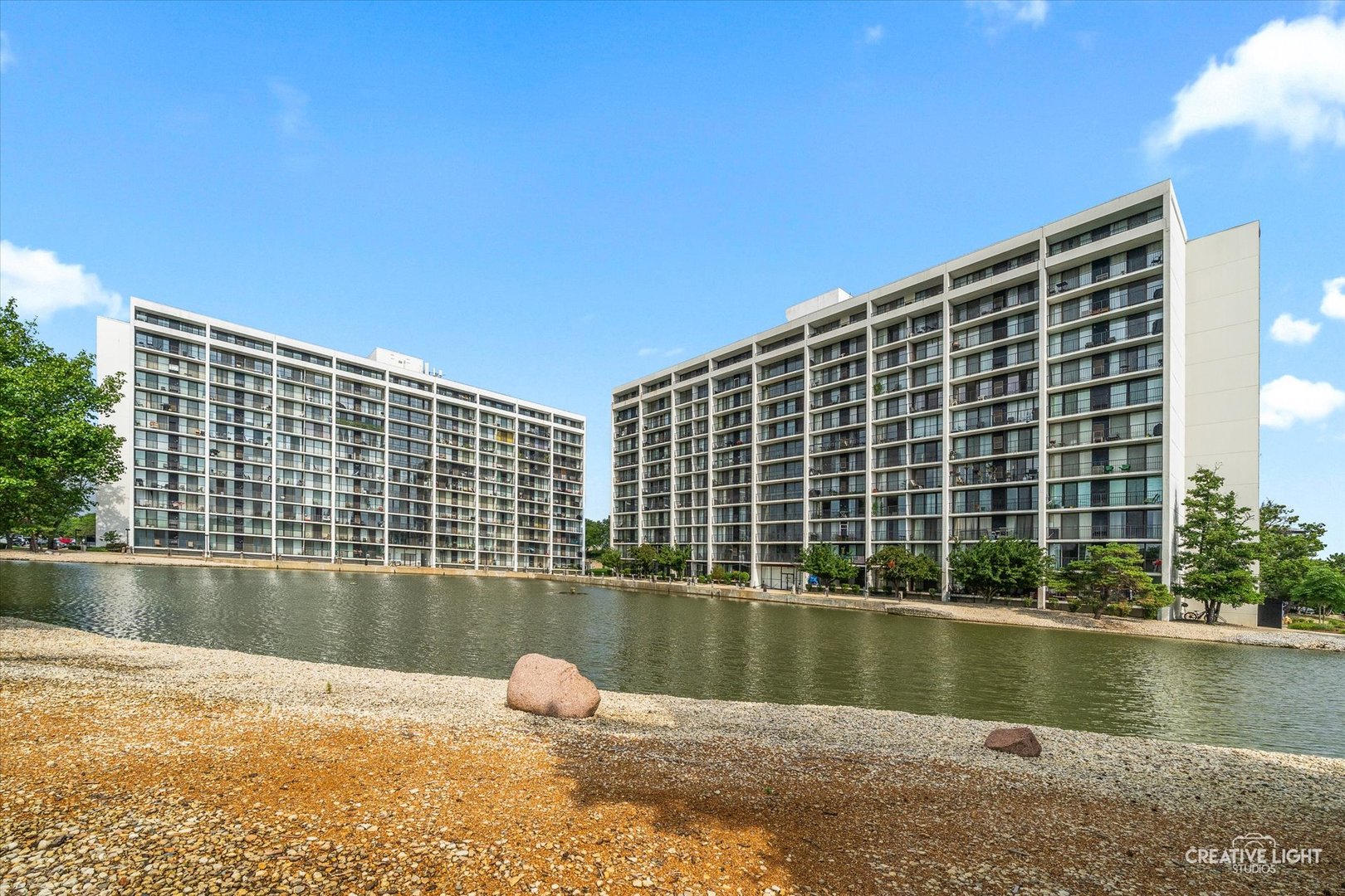 2005 South Finley Road, Unit 1209 Lombard, IL 60148 - Photo 27 of 29 a view of pool with a lake view