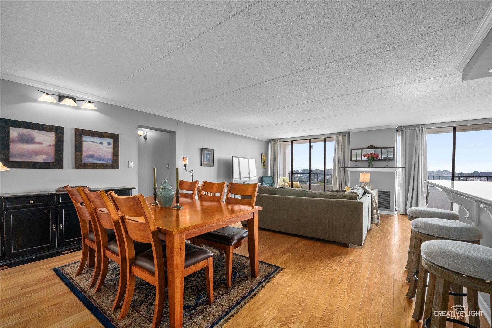 2005 South Finley Road, Unit 1209 Lombard, IL 60148 - Photo 6 of 29 a dining room with furniture and wooden floor