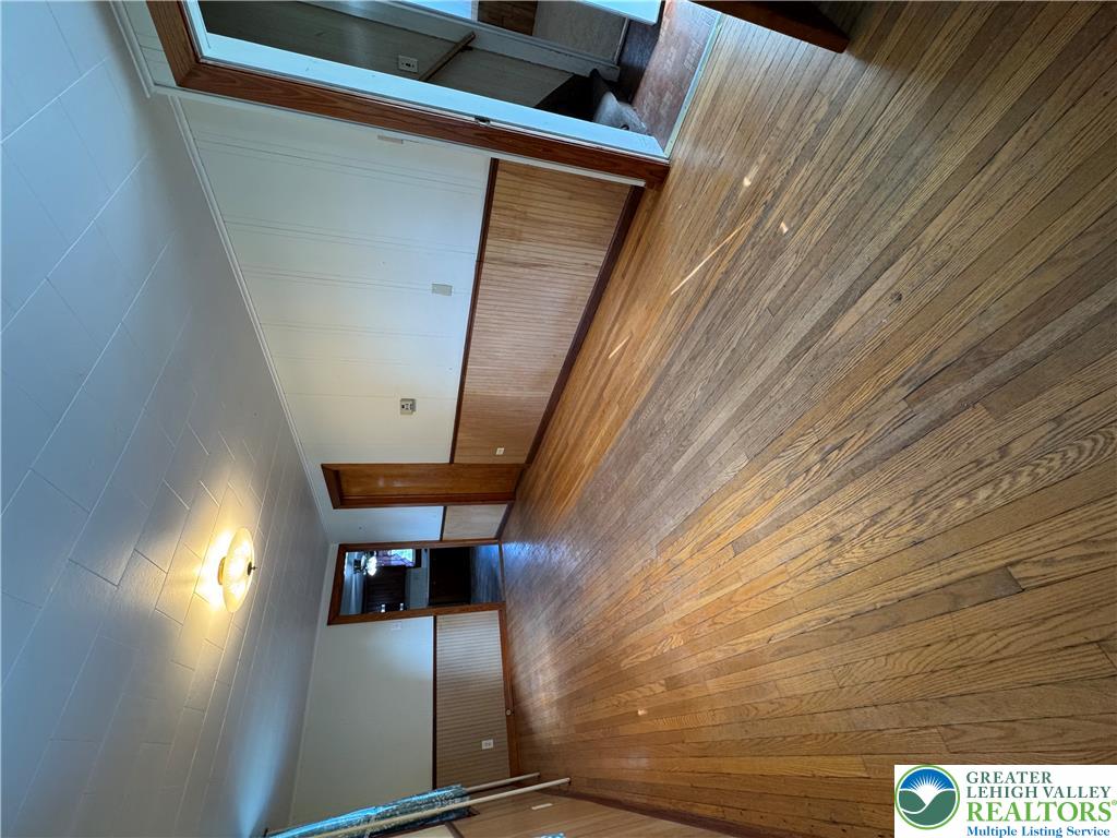 868 Catawissa Road Tamaqua, PA 18252 - Photo 30 of 67 Hardwood floors and classic wood paneling define this inviting interior space.