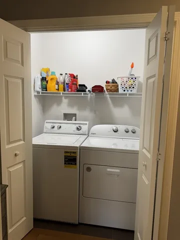 a utility room with dryer and washer