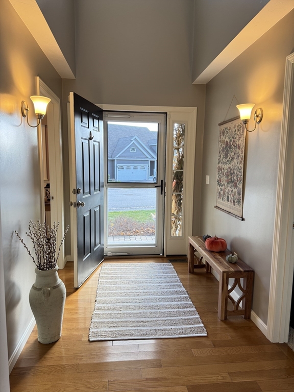 2 Riley Road, Unit B Lunenburg, MA 01462 - Photo 5 of 25 a living room with furniture a rug and a potted plant