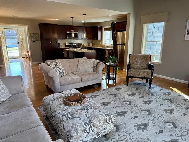 a living room with furniture and a couch