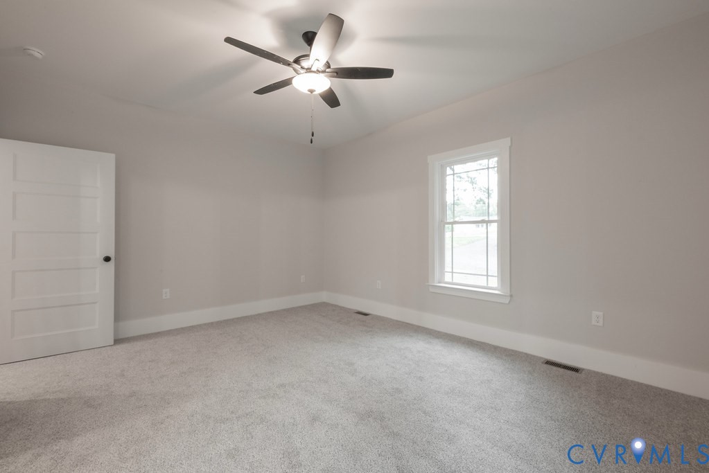 1 Tabscott Road Kents Store, VA 23084 - Photo 28 of 42 Carpeted room with a ceiling fan light fixture, fi