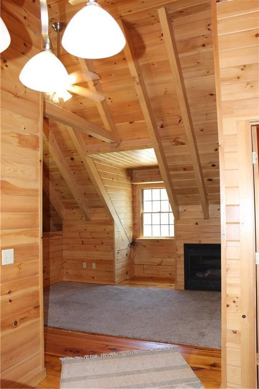 123 Decorum Road Surry, ME 04684 - Photo 9 of 33 Propane fireplace and 8 over 8...