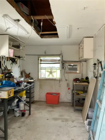 a bathroom with a shower and a mirror