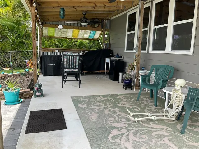 a view of porch and a yard
