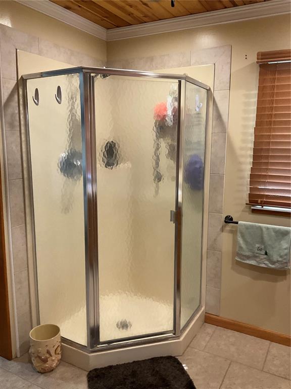 1558 Chobee Street Okeechobee, FL 34974 - Photo 22 of 63 a bathroom with a shower and a mirror