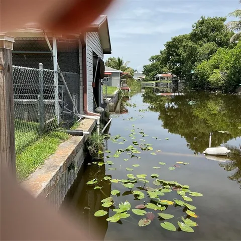 a view of a lobby with furniture and floor to ceiling window
