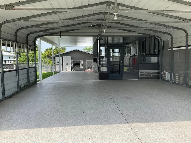a lobby with furniture and window