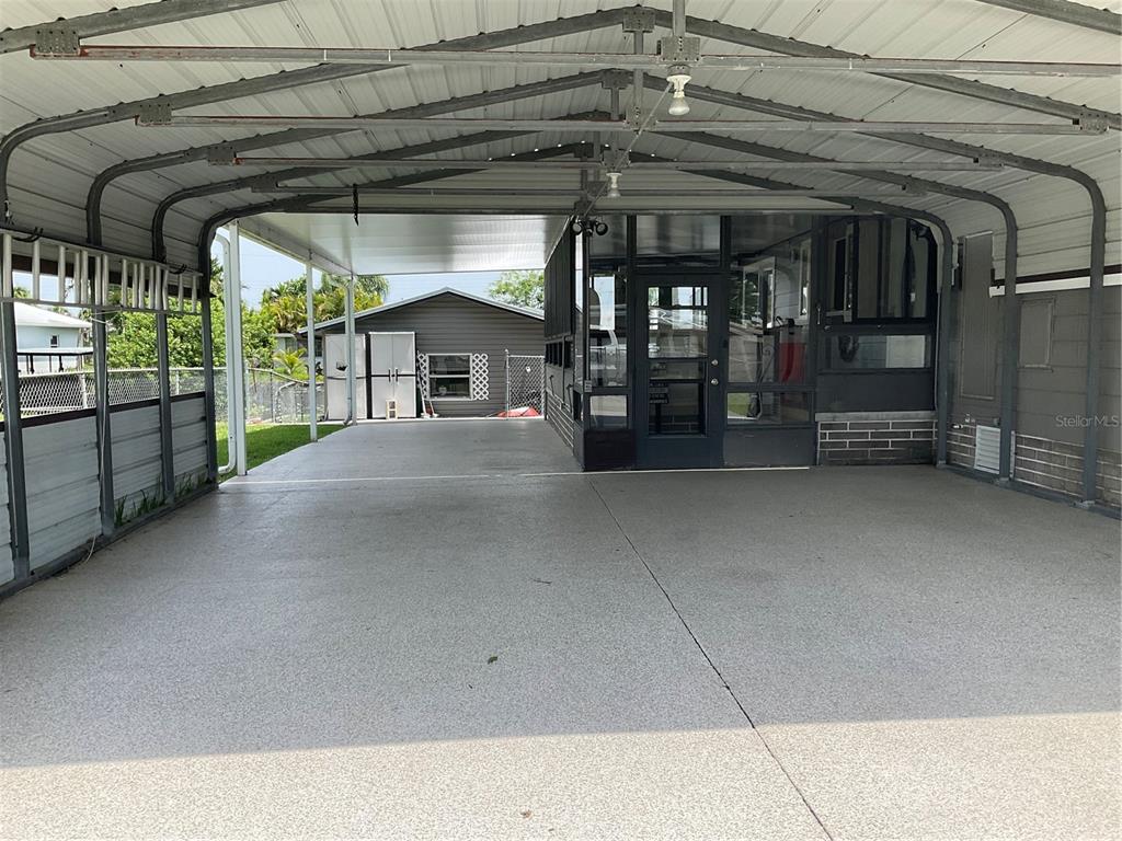 1558 Chobee Street Okeechobee, FL 34974 - Photo 25 of 63 a view of porch and a yard