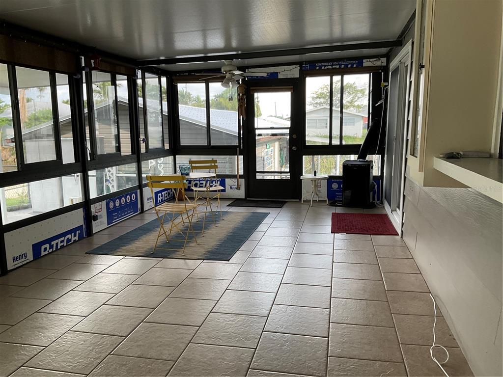 1558 Chobee Street Okeechobee, FL 34974 - Photo 35 of 63 a lobby with furniture and window