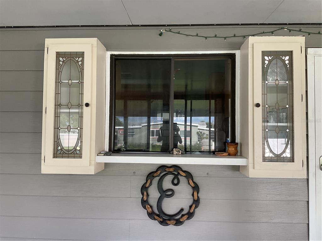 1558 Chobee Street Okeechobee, FL 34974 - Photo 38 of 63 a bathroom with a tub and a window