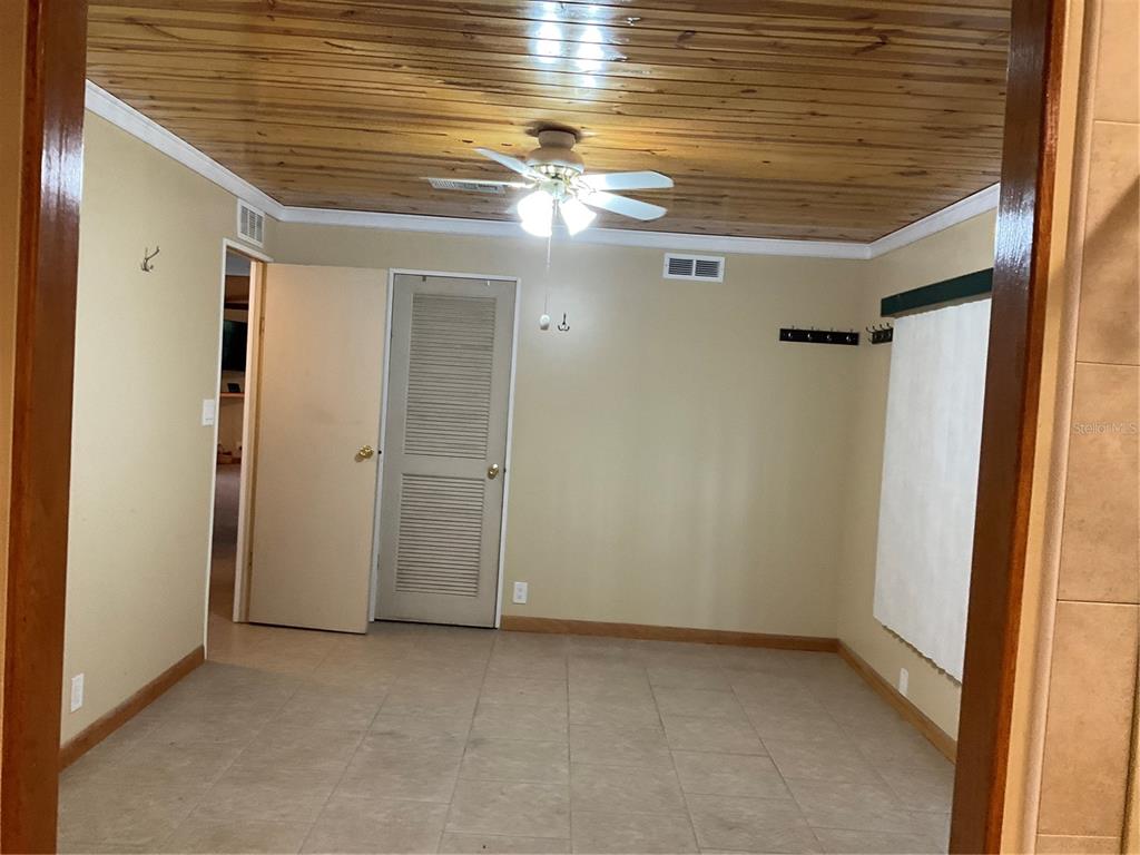 1558 Chobee Street Okeechobee, FL 34974 - Photo 55 of 63 a view of a livingroom with an empty space