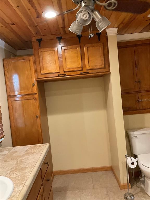 1558 Chobee Street Okeechobee, FL 34974 - Photo 57 of 63 a view of a storage & utility room with a sink